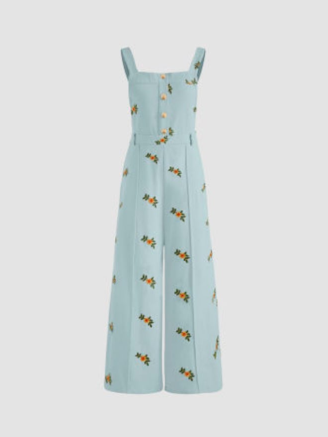 Mother's Day outfit ideas for moms who like jumpsuits: this blue one with embroidered flowers