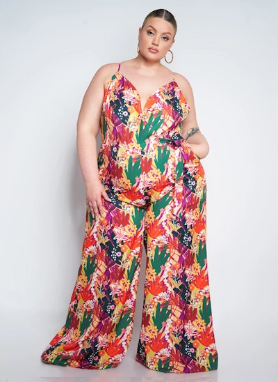 Mother's Day outfit ideas for jumpsuit lovers: a vibrant floral spahgetti strap option with wide leg...