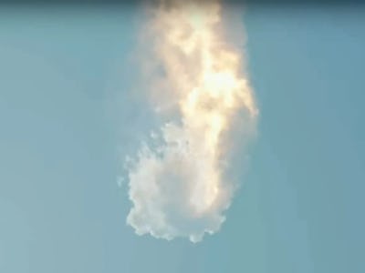 A fiery, smoky explosion in a clear blue Texas sky