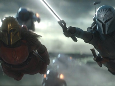 Bo-Katan (Katee Sackhoff) and The Armorer (Emily Swallow) soar through the air together in The Manda...