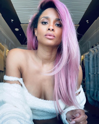 Ciara purple hair with roots