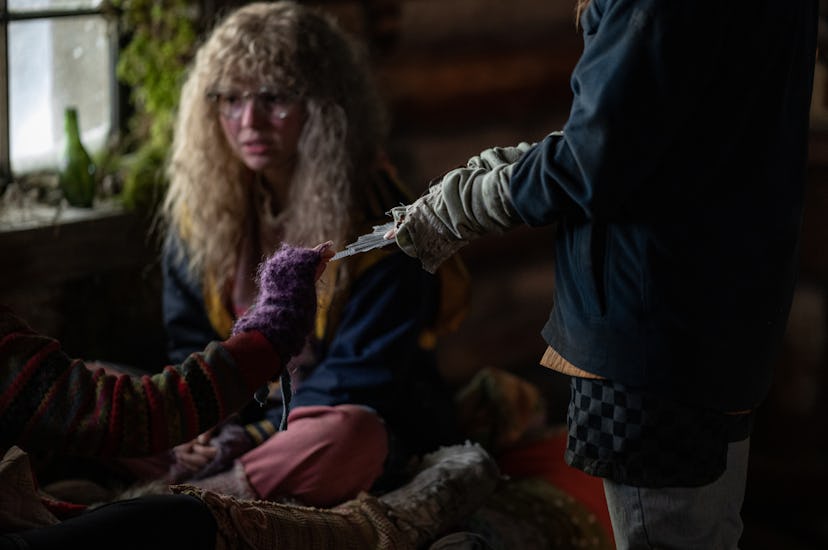 Samantha Hanratty as teen Misty drawing cards in ‘Yellowjackets’ Season 2, via Showtime’s press site…