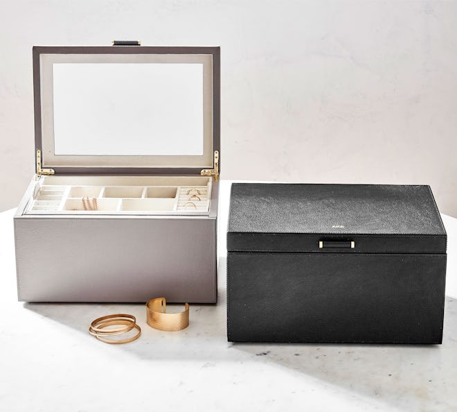 Two black and silver jewelry boxes, which would make great Mother's Day gifts for jewelry-obsessed m...