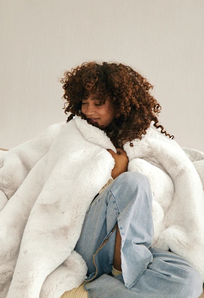 Mother's Day gifts for moms who like to stay in: a thick fuzzy blanket from brand Unhide