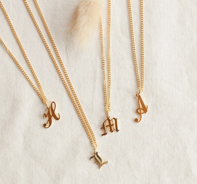 A gold initial necklace is a fashionable Mother's Day gift.