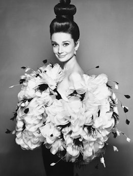 Richard Avedon, Audrey Hepburn. Dress by Yves St. Laurent, earrings by Harry Winston, hair by Alexan...