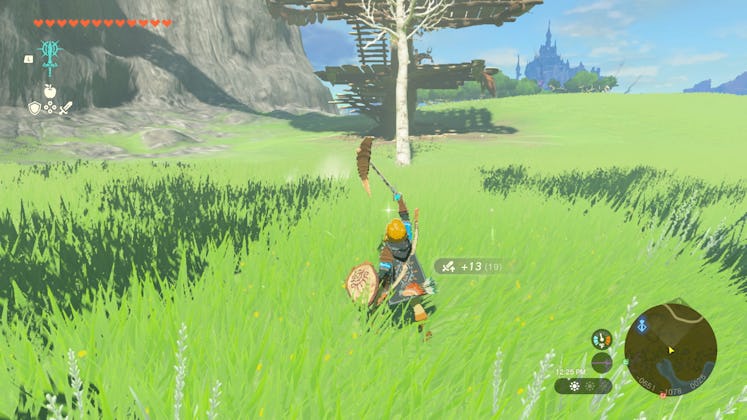 Link uses the Fuse ability in Tears of the Kingdom to create a new weapon.