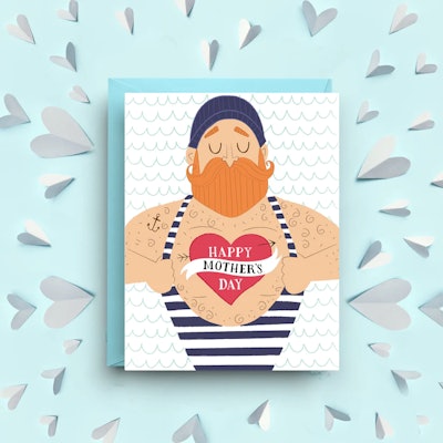 Funny Mother's Day card with a sailor showing off his giant Mom heart tattoo