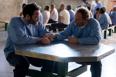 Bill Hader and Stephen Root sit at a table together in jail in Barry Season 4