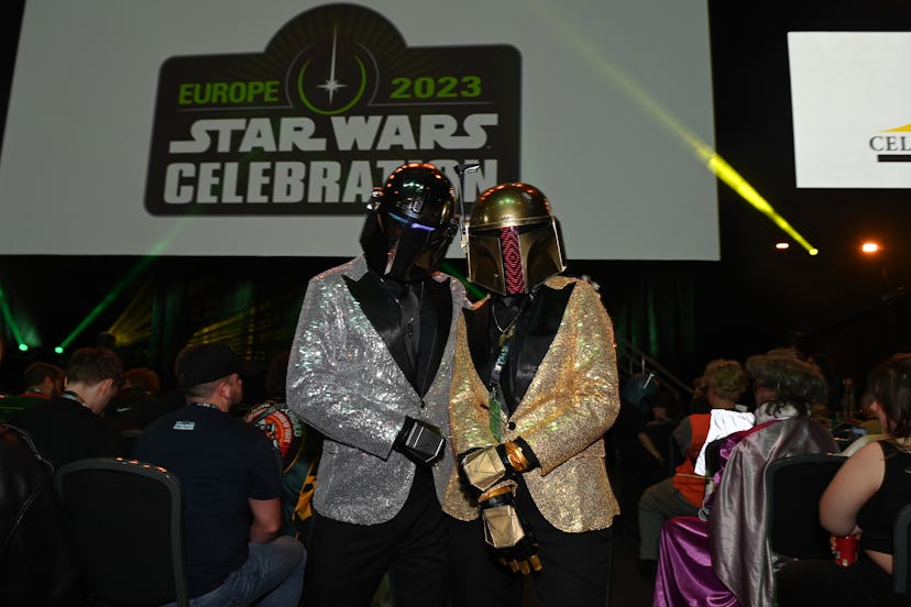 Fans in Mandalorian helmets and sparkling blazers at Star Wars Celebration