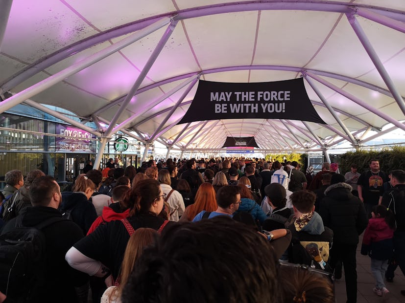 A sign at Star Wars Celebration reads "May the Force be with you."