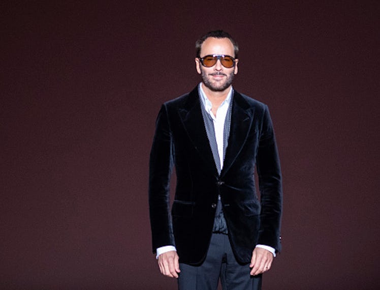 Tom Ford wearing a black suit