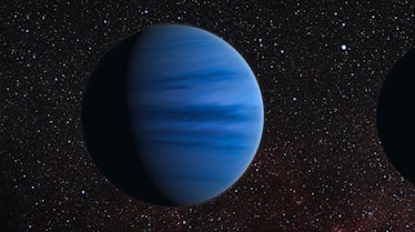 A blue planet with bands of light and dark blue on a starry black background