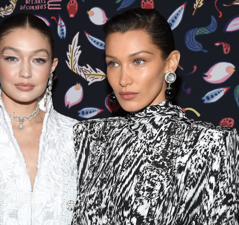 Gigi Hadid and Bella Hadid attend the Harper's Bazaar Exhibition