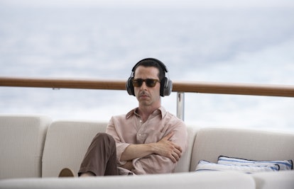 Succession Kendall Roy wearing headphones on boat