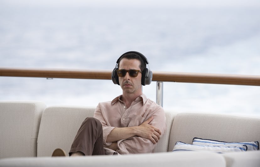 Succession Kendall Roy wearing headphones on boat