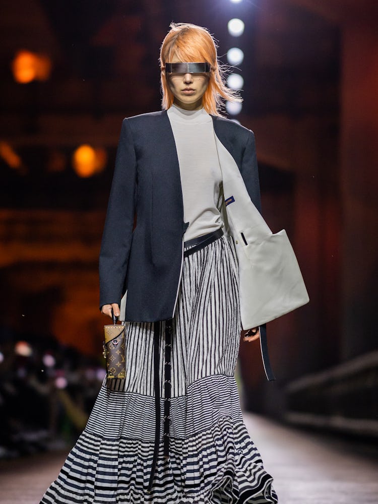  A model walks the runway during the Louis Vuitton Pre-Fall 2023 Show on the Jamsugyo Bridge at the ...