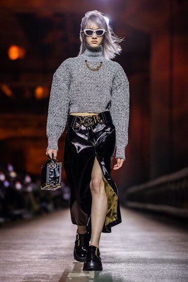 A model walks the runway during the Louis Vuitton Pre-Fall 2023 Show on the Jamsugyo Bridge at the H...