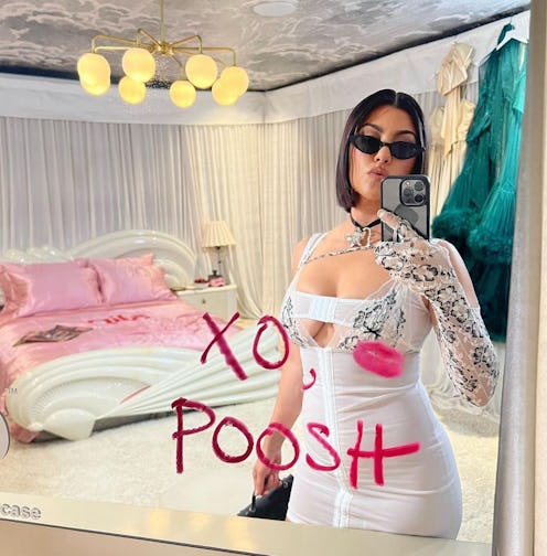 Poosh founder Kourtney Kardashian Barker wore cherry nails, a short white manicure with simple nail ...