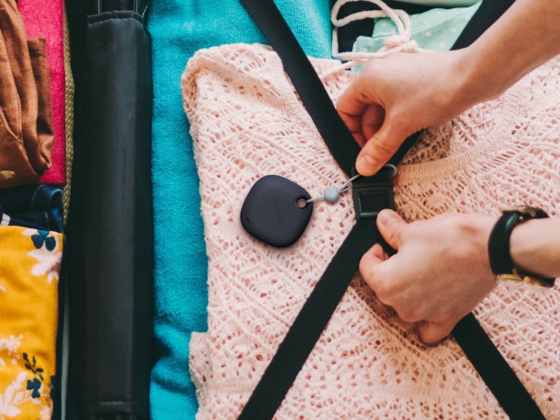 The Galaxy SmartTag attached to a suitcase.