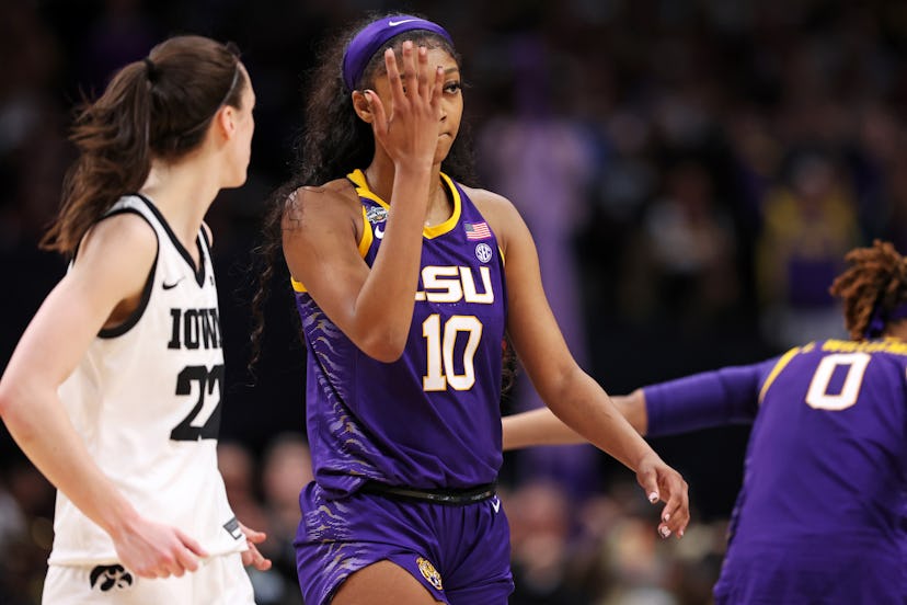Angel Reese #10 of the LSU Lady Tigers reacts towards Caitlin Clark #22 of the Iowa Hawkeyes during ...