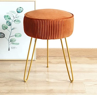 If you're looking for cheap yet popular decor items for your home, consider this velvet stool that w...