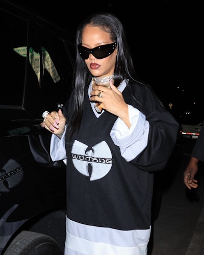 Rihanna dark red lipstick and liner in Wu-Tang sweater April 2023
