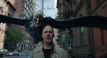 Birdman Michael Keaton with Birdman behind him
