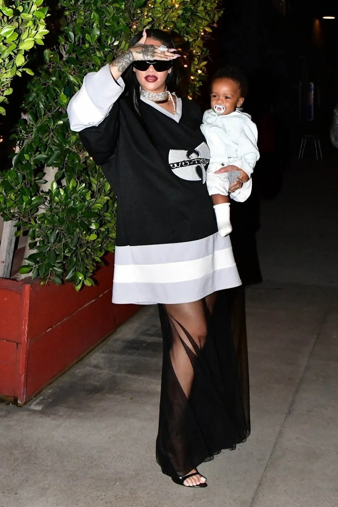Rihanna Dressed Up a Hockey Jersey for a Night Out With the Family