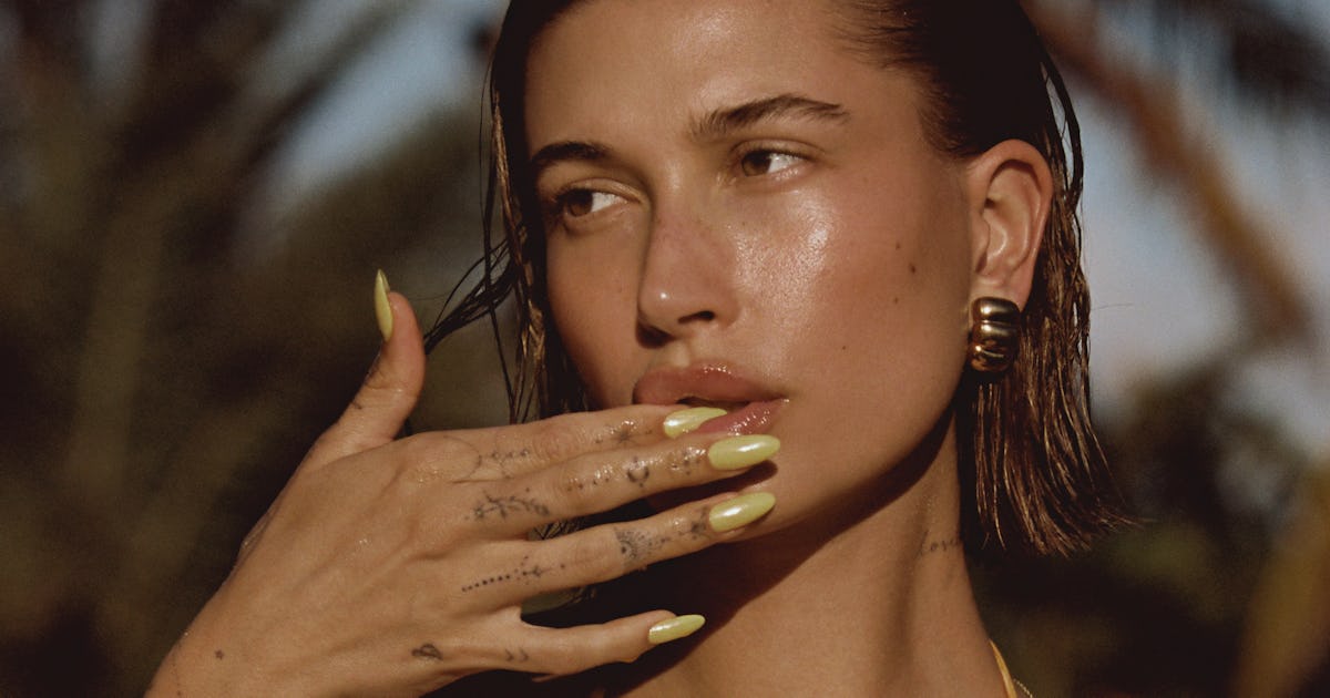 Hailey Bieber Wore A Thong Bikini & $11k Body Chain For Rhode Beauty