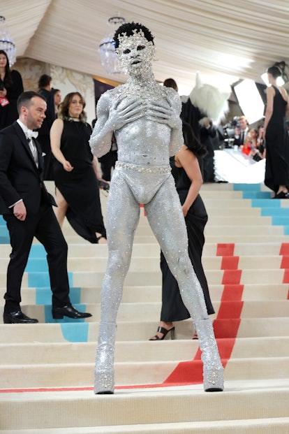 Lil Nas X in full glitter and metallics at the 2023 Met Gala.