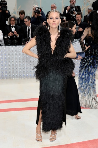 Sienna Miller attends The 2023 Met Gala Celebrating "Karl Lagerfeld: A Line Of Beauty" at The Metrop...