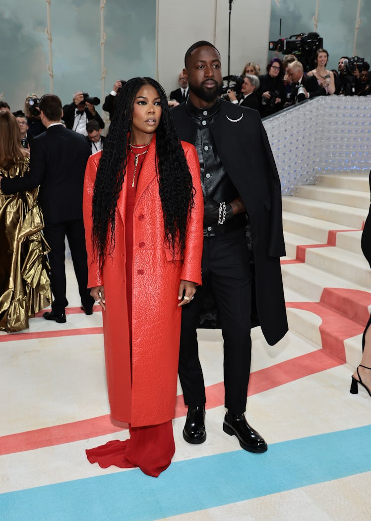 Gabrielle Union and Dwyane Wade attend The 2023 Met Gala Celebrating "Karl Lagerfeld: A Line Of Beau...