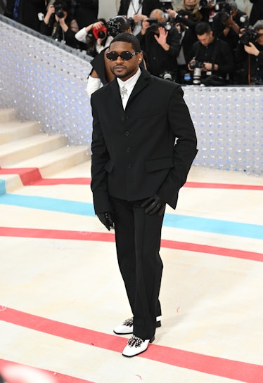 Usher Raymond IV attends The 2023 Met Gala Celebrating "Karl Lagerfeld: A Line Of Beauty" at The Met...