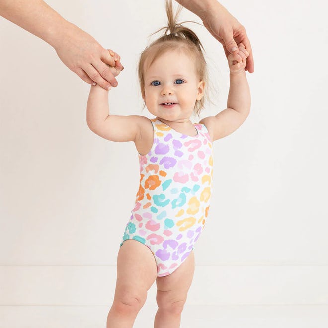 Baby swimsuit, a one-piece in pastel rainbow leopard print