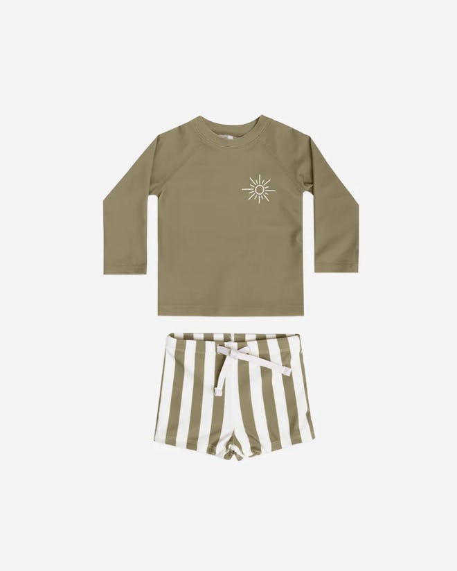 Baby swimsuit set with an olive green rash guard and striped trunks