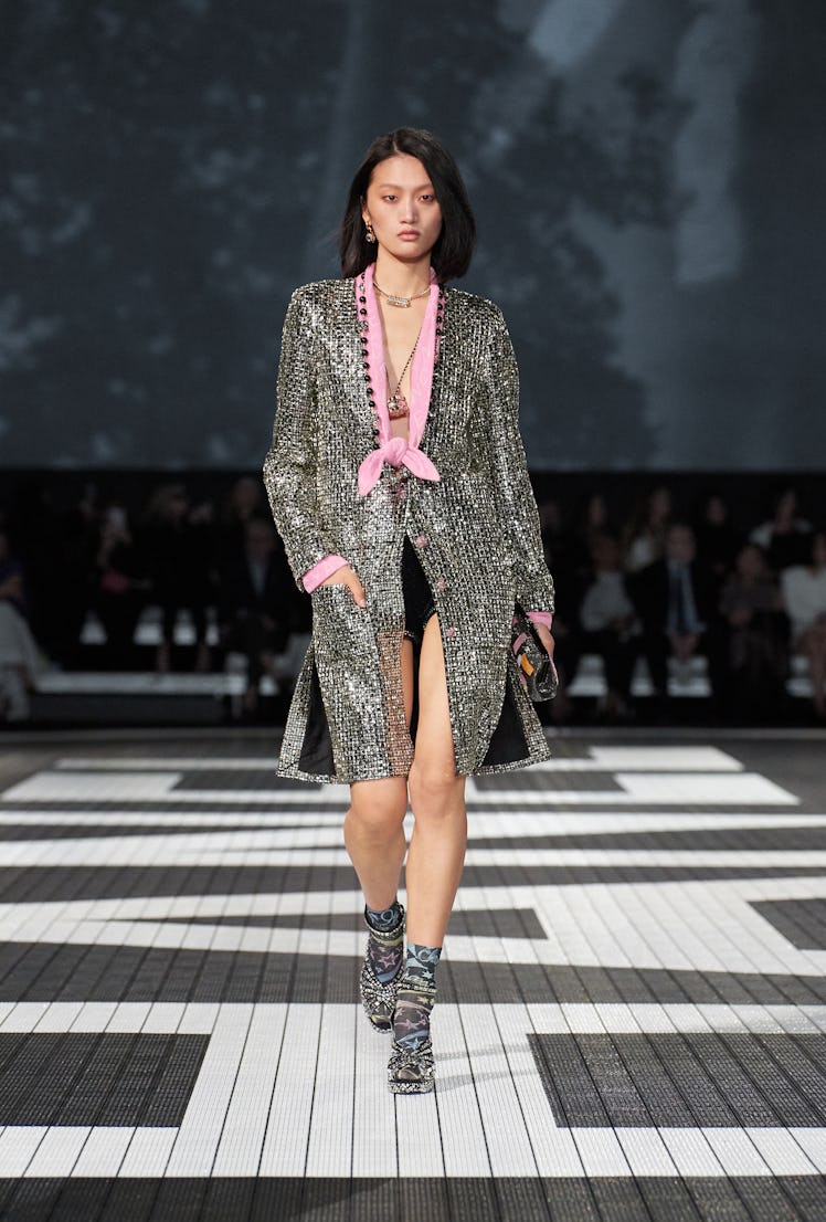 A model on the runway at Chanel Cruise 2024 Ready To Wear Fashion Show at Paramount Studios on May 9...