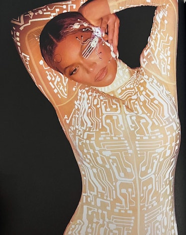 Beyoncé wears an archival Givenchy by Alexander McQueen Fall/Winter 1999 catsuit.