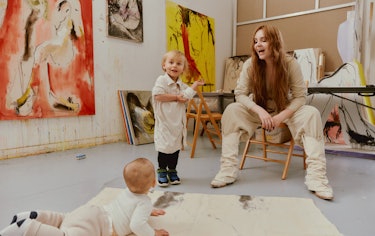 Designer Elena Velez at her design studio with her children Atlas, 2, and baby Freja Lucia.