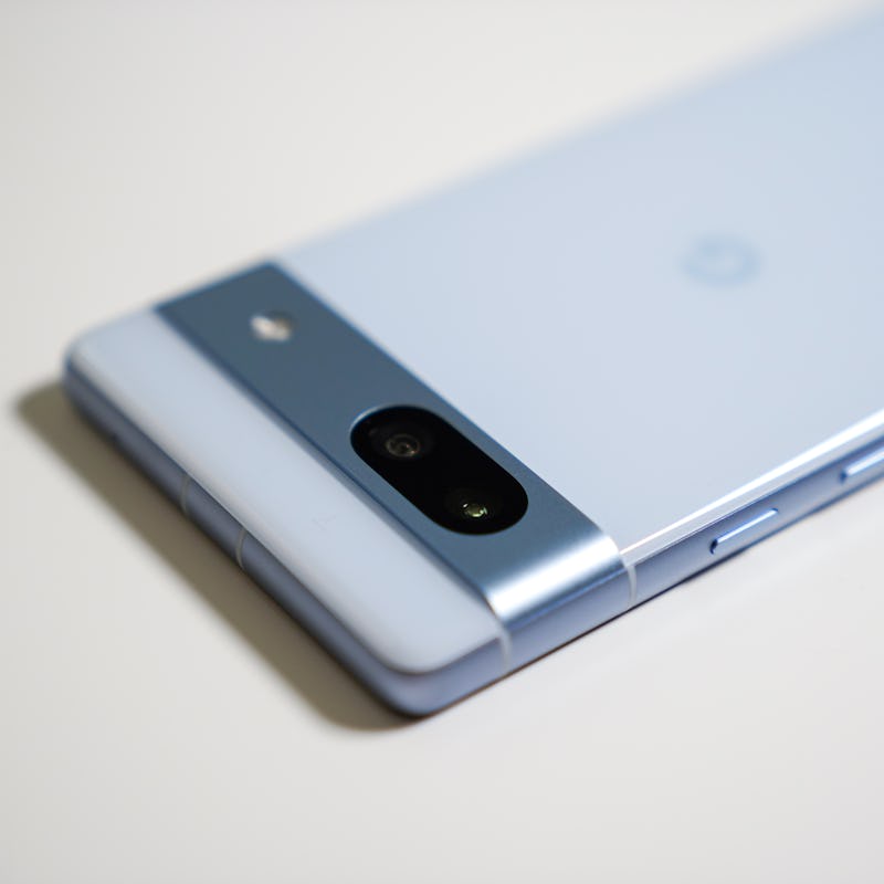 A close-up of the Google Pixel 7a's dual cameras, including its 64-megapixel main camera