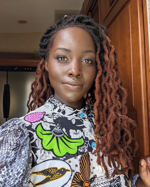 Lupita Nyong'o with copper locs.
