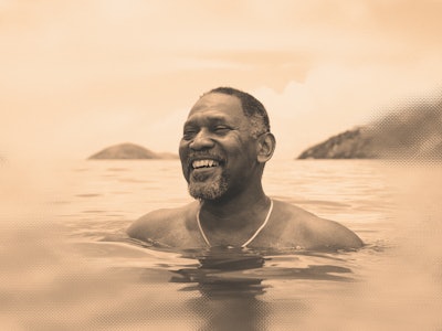 man swimming in ocean