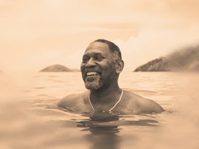 man swimming in ocean