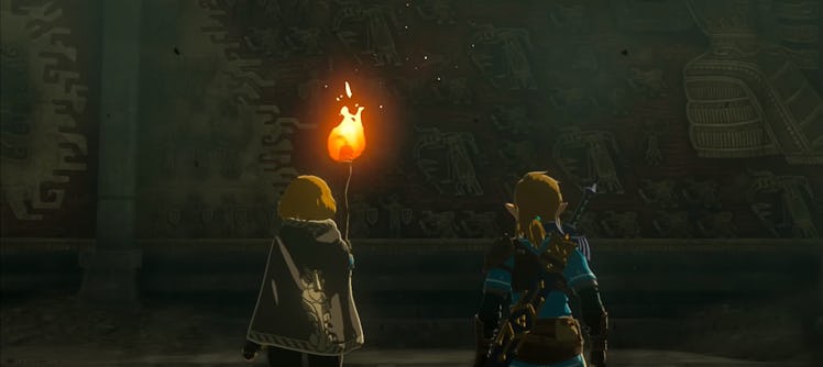 ToTK Zelda and Link looking at murals underneath Hyrule Castle.