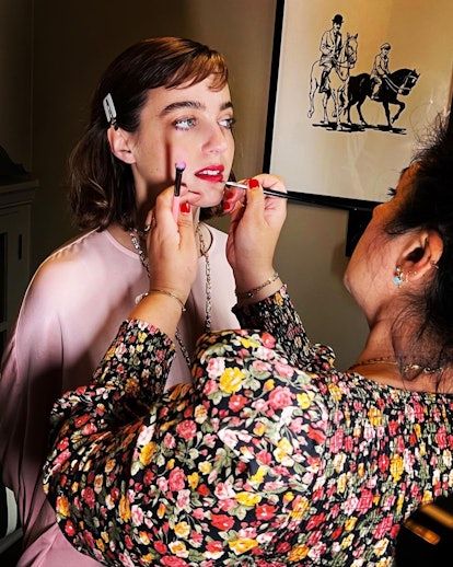 Makeup artist Kirin Bhatty applies lipstick on Beatrice Grannò