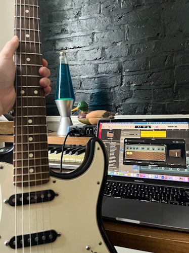 Inverse Senior Editor James Pero recording music with GarageBand on an M1 MacBook Pro