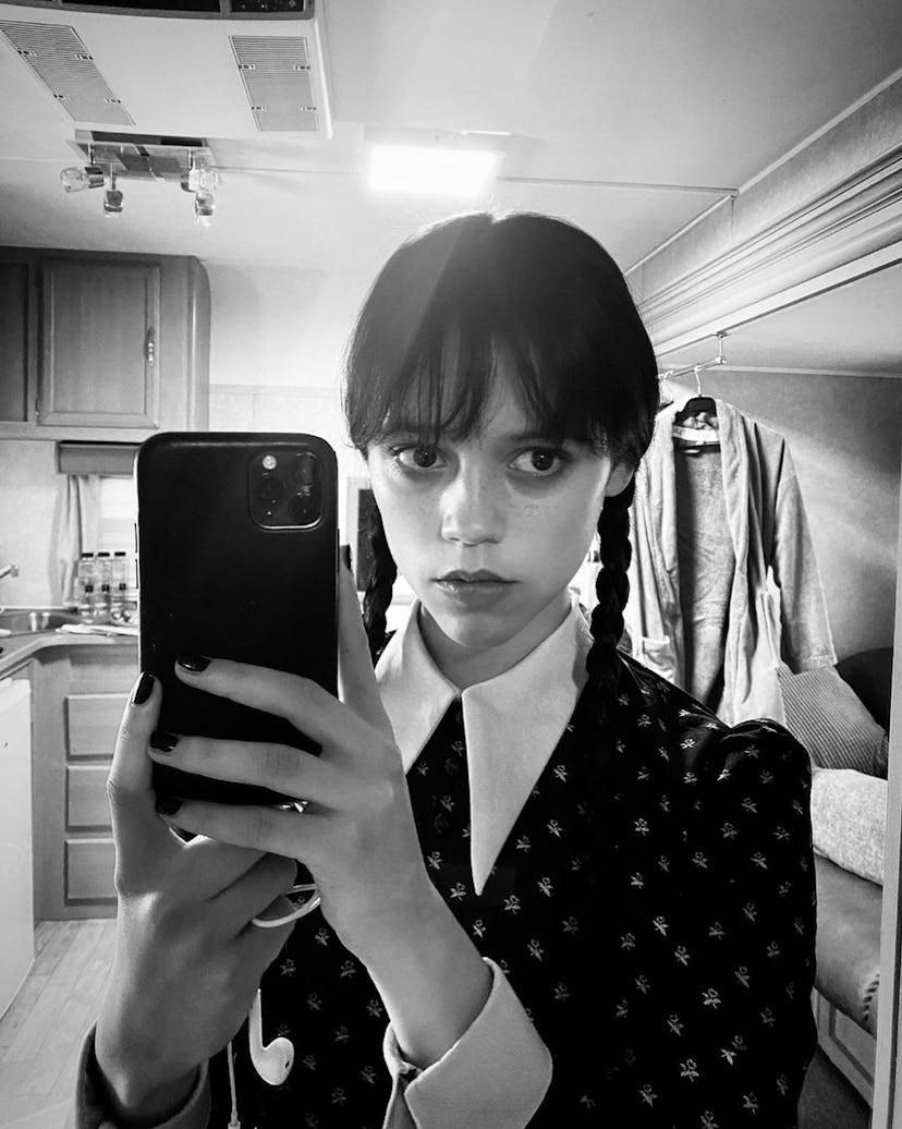 Jenna Ortega's iconic Wednesday Addams' hairstyle.