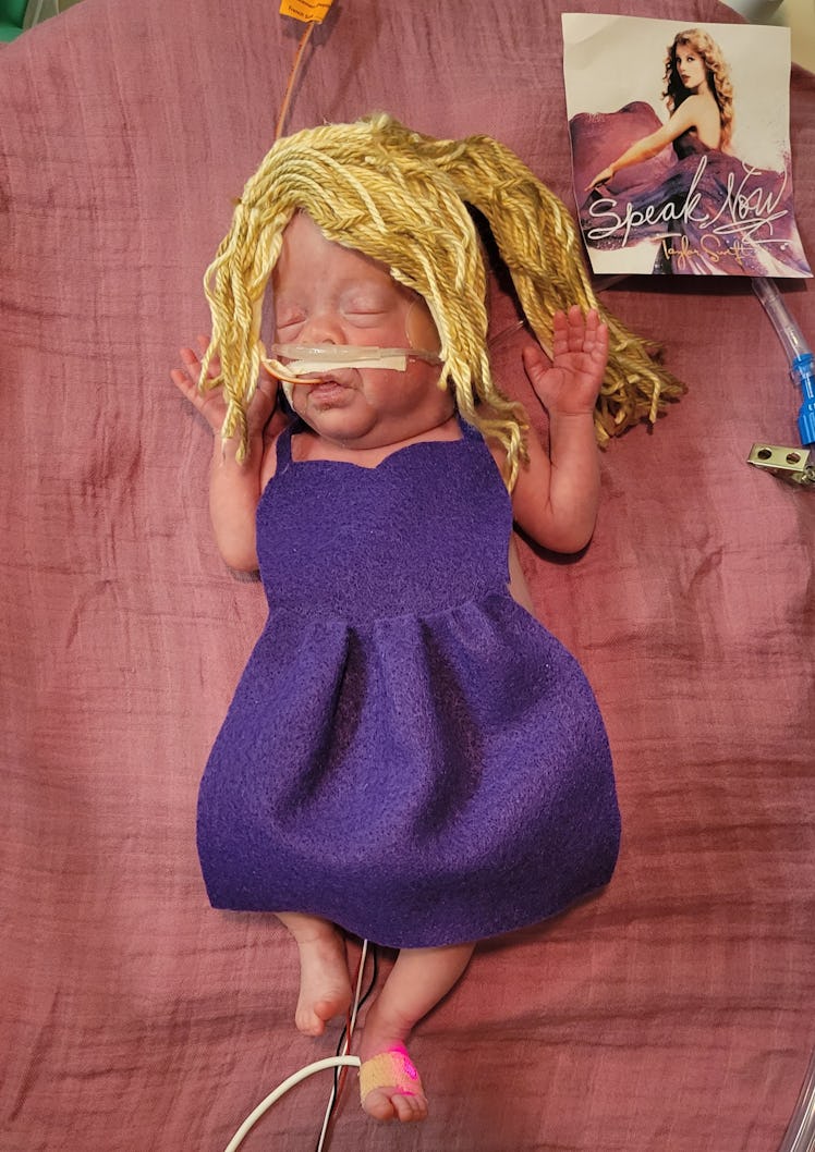 A NICU baby dressed up like Taylor Swift.