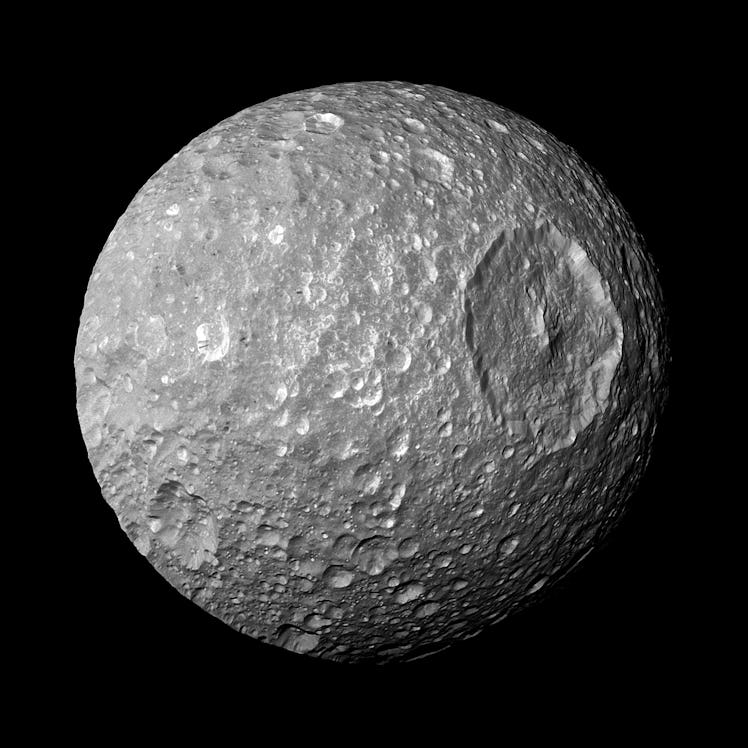 mimas, which has a deep, large crater on one side and looks kind of like the death star in star wars