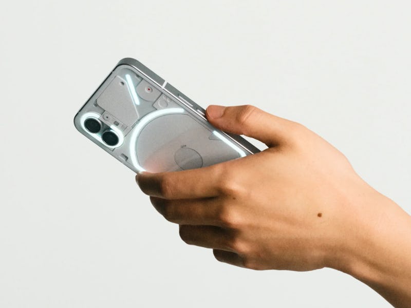 White-colored Nothing Phone 1 with Glyph LEDs turned on